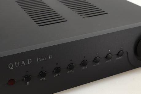Close up of a used Quad Vena II Integrated Amplifier in a lancaster grey finish showing some of the fascia