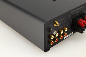 Rear right corner of a used Quad Vena II Integrated Amplifier in a lancaster grey finish