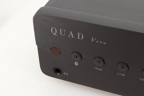 Close up view of a used Quad Vena Integrated Amplifier in Lancaster Grey finish showing some marks on the left side of the fascia 