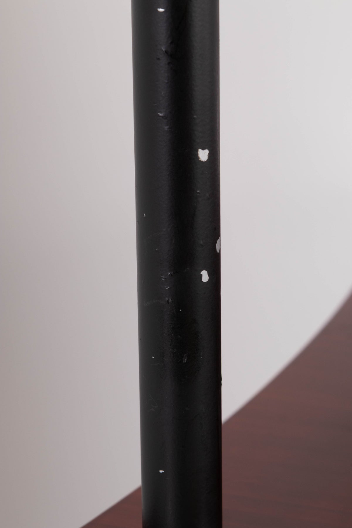 Close up of a used Quadraspire 4 Shelf Hifi Stand in a Dark Cherry / Black finish showing damage on stand