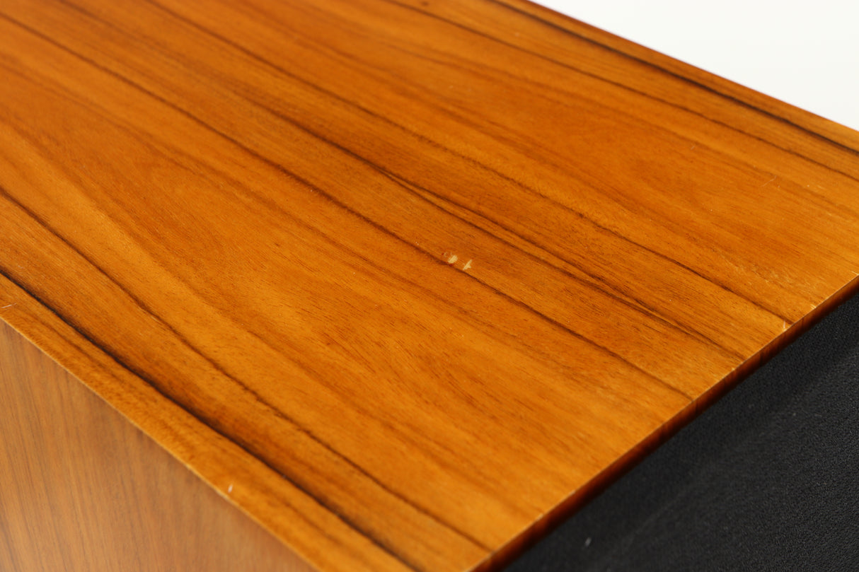 Close up of a used Red Rose Music Spirit Ribbon Standmount Speaker in a rosewood finish showing blemish on top