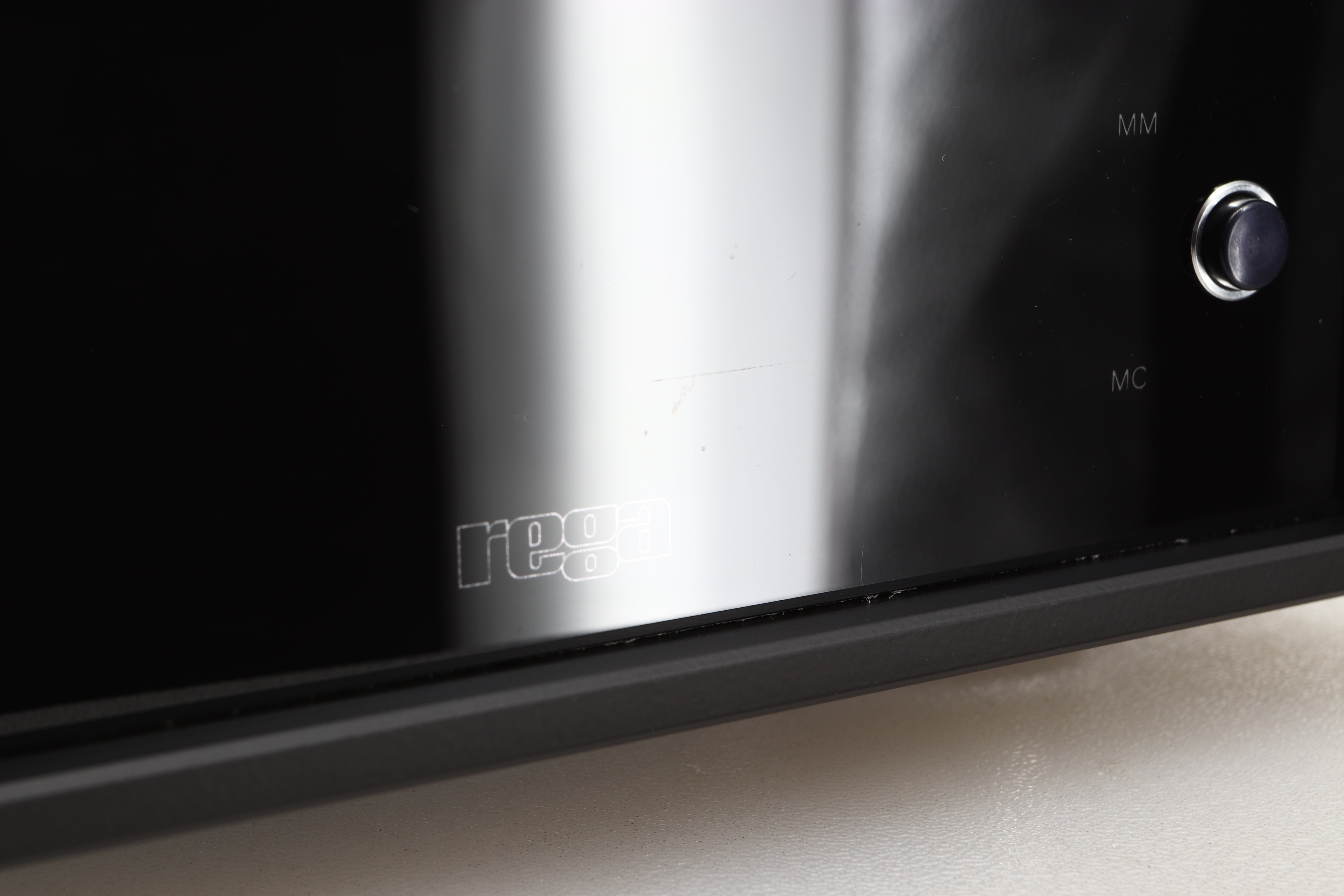 Close up of a used Rega Aria MK3 Phonostage in a black finish showing small scratch on screen