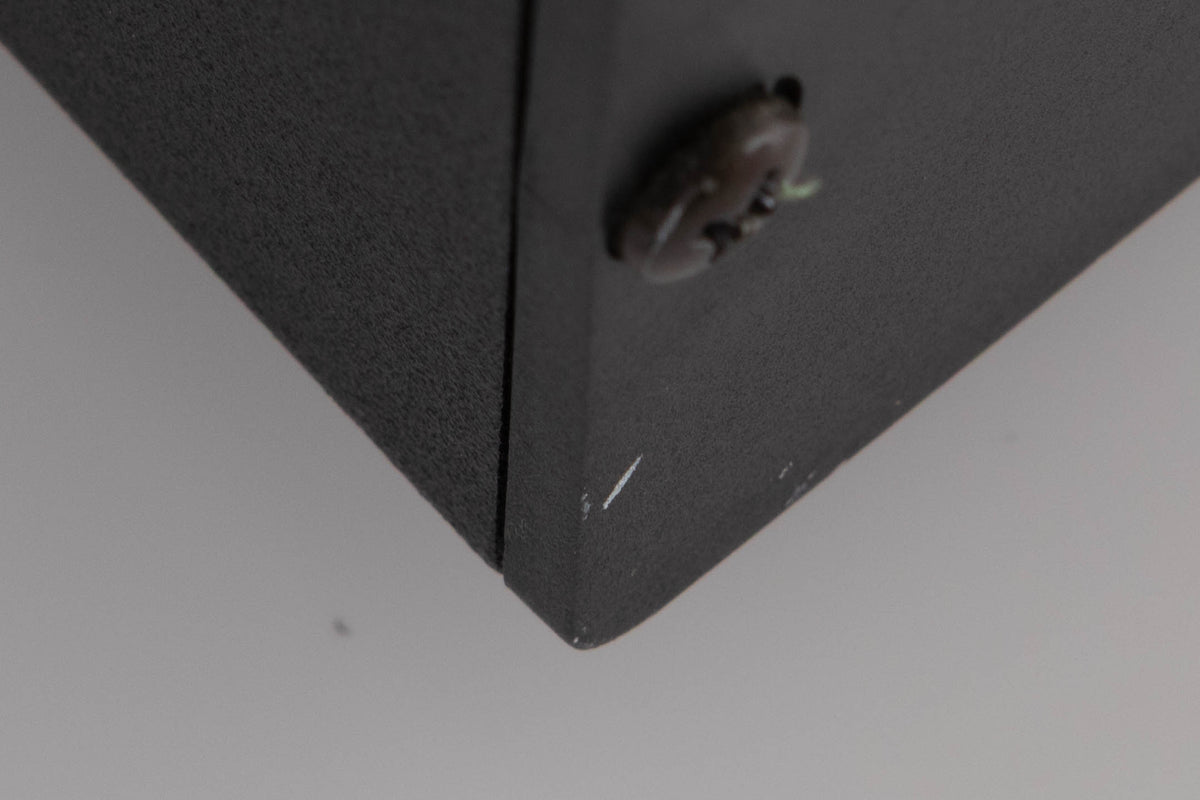 Close up of a used Rega Brio Integrated Amplifier in a Black finish showing tiny nick on rear