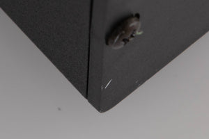 Close up of a used Rega Brio Integrated Amplifier in a Black finish showing tiny nick on rear
