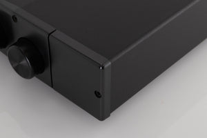 Front right corner of a used Rega Brio Integrated Amplifier in a Black finish