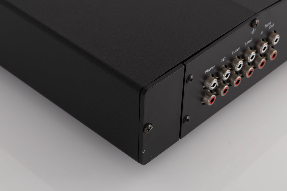 Rear right corner of a used Rega Brio Integrated Amplifier in a Black finish