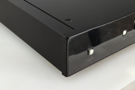 Front left corner of a used Rega Brio-R Integrated Amplifier in a black finish