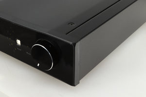 Front right corner of a used Rega Brio-R Integrated Amplifier in a black finish