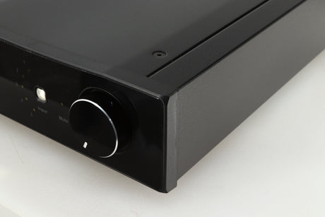 Front right corner of a used Rega Brio-R Integrated Amplifier in a black finish