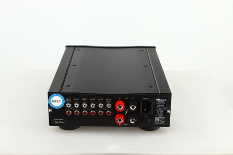 Rear view of a used Rega Brio-R Integrated Amplifier in a black finish showing Phono Inputs, Speaker Inputs and Mains Input