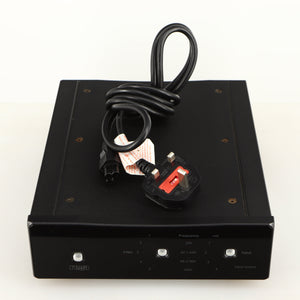 Top of a used Rega DAC Digital Analogue Converter in a black finish showing Power Cable