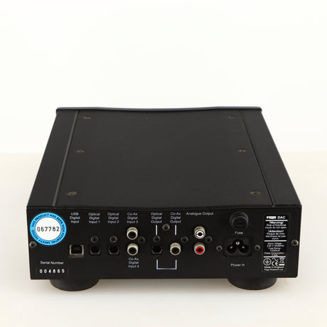 Rear view of a used Rega DAC Digital Analogue Converter in a black finish showing Power Input, Phono Inputs, Phono Outputs, Optical Inputs, Optical Inputs and USB Output