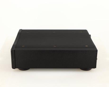 Right side view of a used Rega DAC Digital Analogue Converter in a black finish