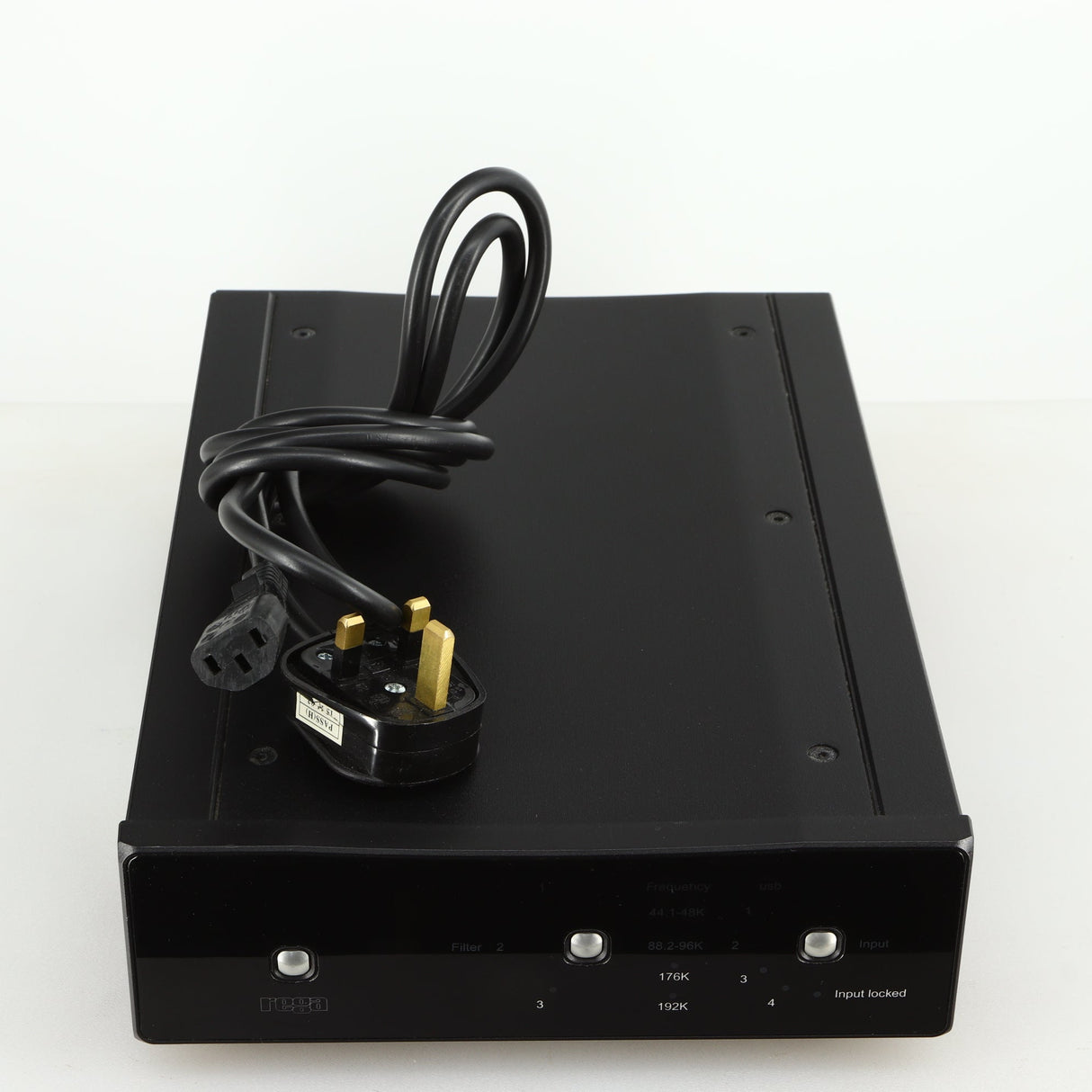 Top view of a used Rega DAC-R Digital Analogue Converter in a black finish showing mains cable