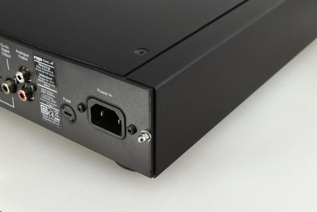 Rear left corner of a used Rega DAC-R Digital Analogue Converter in a black finish