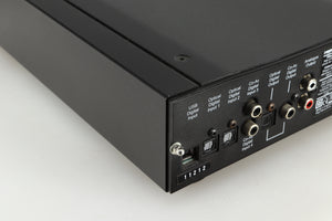Rear right corner of a used Rega DAC-R Digital Analogue Converter in a black finish