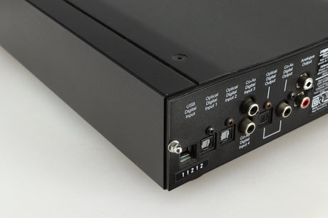 Rear right corner of a used Rega DAC-R Digital Analogue Converter in a black finish
