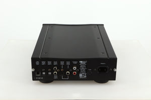 Rear view of a used Rega DAC-R Digital Analogue Converter in a black finish showing Analogue Outputs, Mains Input, Optical Digital Outputs and Inputs and USB Digital Input