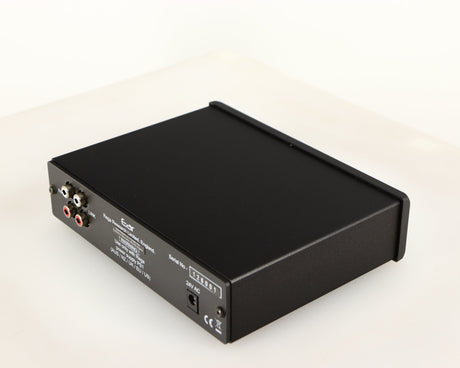 Rear left corner of a used Rega EAR Headphone Amplifier in a black finish