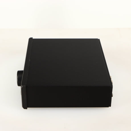 Right side view of a used Rega EAR Headphone Amplifier in a black finish