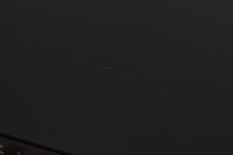 Close up of a used Rega Elex MK4 Integrated Amplifier in a Black finish showing scratches on top