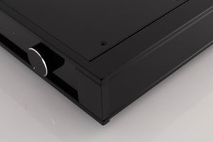 Front right corner of a used Rega Elex MK4 Integrated Amplifier in a Black finish