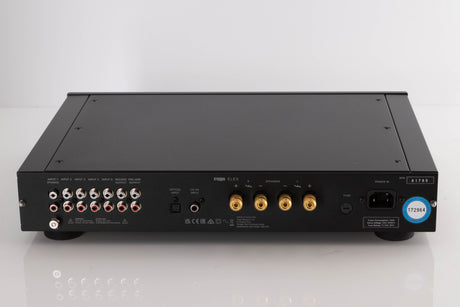 Rear view of a used Rega Elex MK4 Integrated Amplifier in a Black finish showing Phono Inputs, Phono Outputs, Optical Input and Mains Input