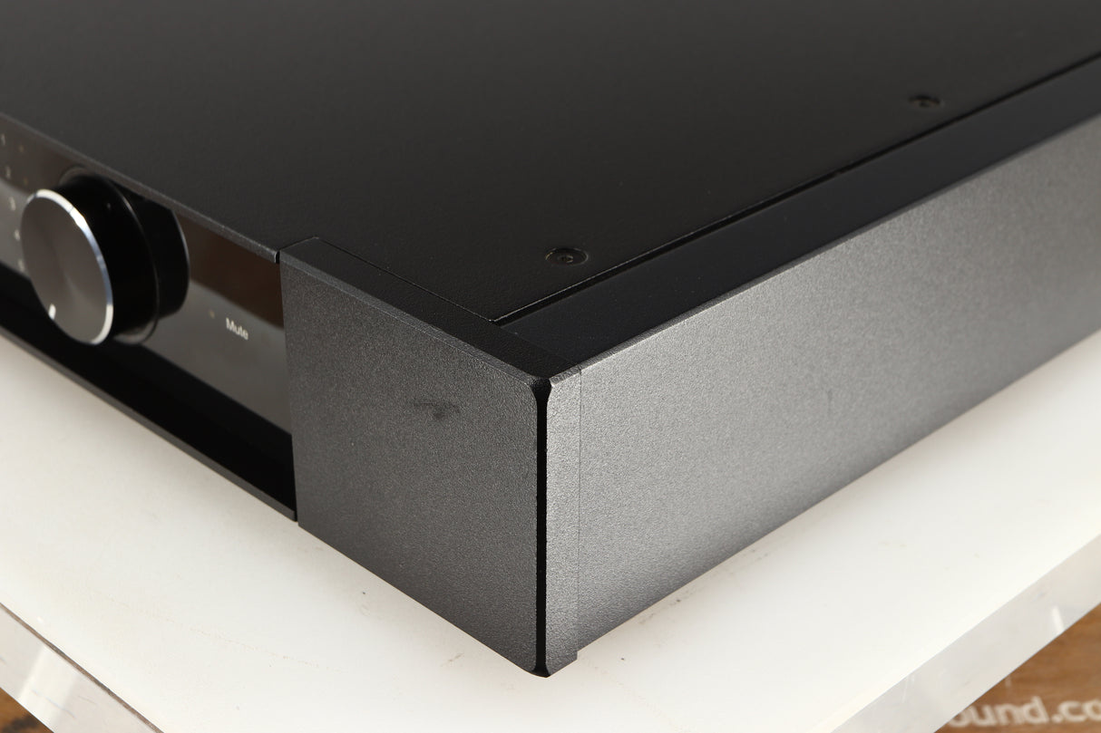 Front right corner of a used Rega Elex-R Integrated Amplifier in a black finish