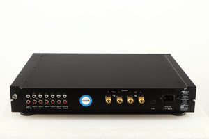 Rear view of a used Rega Elex-R Integrated Amplifier in a black finish showing Phono Inputs, Phono Outputs, Speaker Outputs and Mains Input