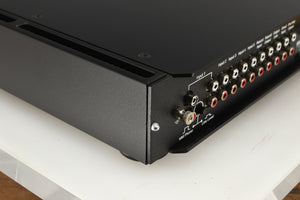 Rear right corner of a used Rega Elicit-R Integrated Amplifier in a black finish