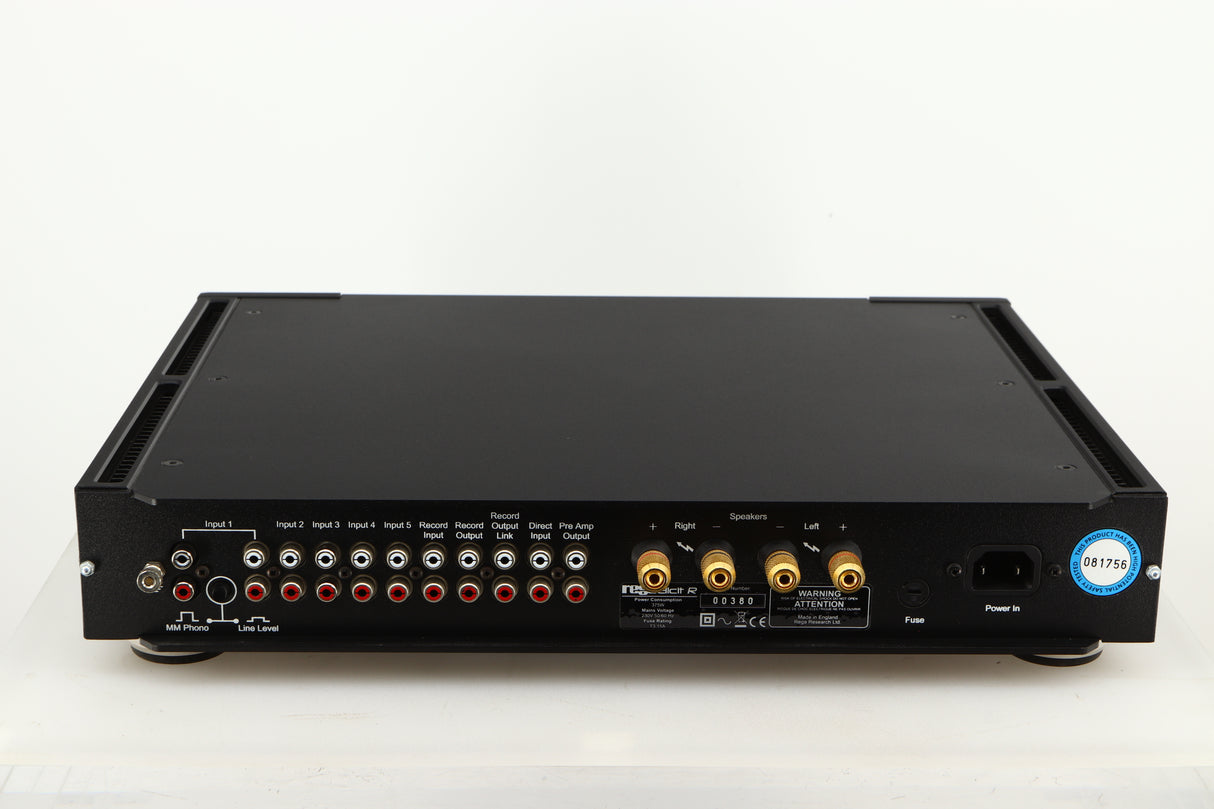 Rear view of a used Rega Elicit-R Integrated Amplifier in a black finish showing Mains Input, Phono Inputs, Phono Outputs and Speaker Outputs