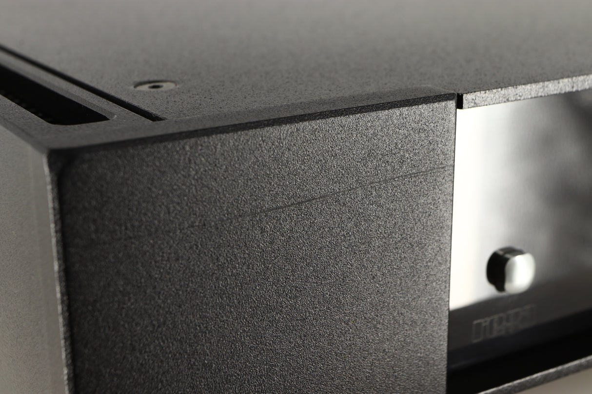 Close up view of a used Rega Elicit-R Integrated Amplifier showing a scratch on the left side of the fascia