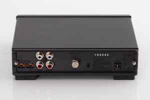 Rear view of a used Rega FONO MC MK4 Phonostage in a Black finish showing Power Input, Phono Inputs and Phono Outputs
