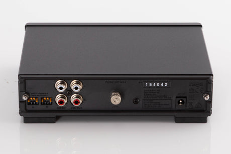 Rear view of a used Rega FONO MC MK4 Phonostage in a Black finish showing Power Input, Phono Inputs and Phono Outputs