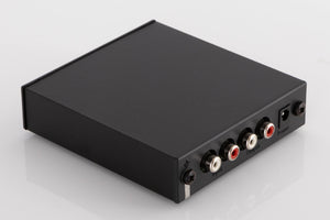 Rear right corner of a used Rega FONO MINI A2D Phonostage in a Black finish