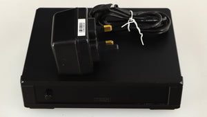 Top of a used Rega FONO MM MK5 Phonostage in a black finish showing PSU