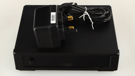Top of a used Rega FONO MM MK5 Phonostage in a black finish showing PSU