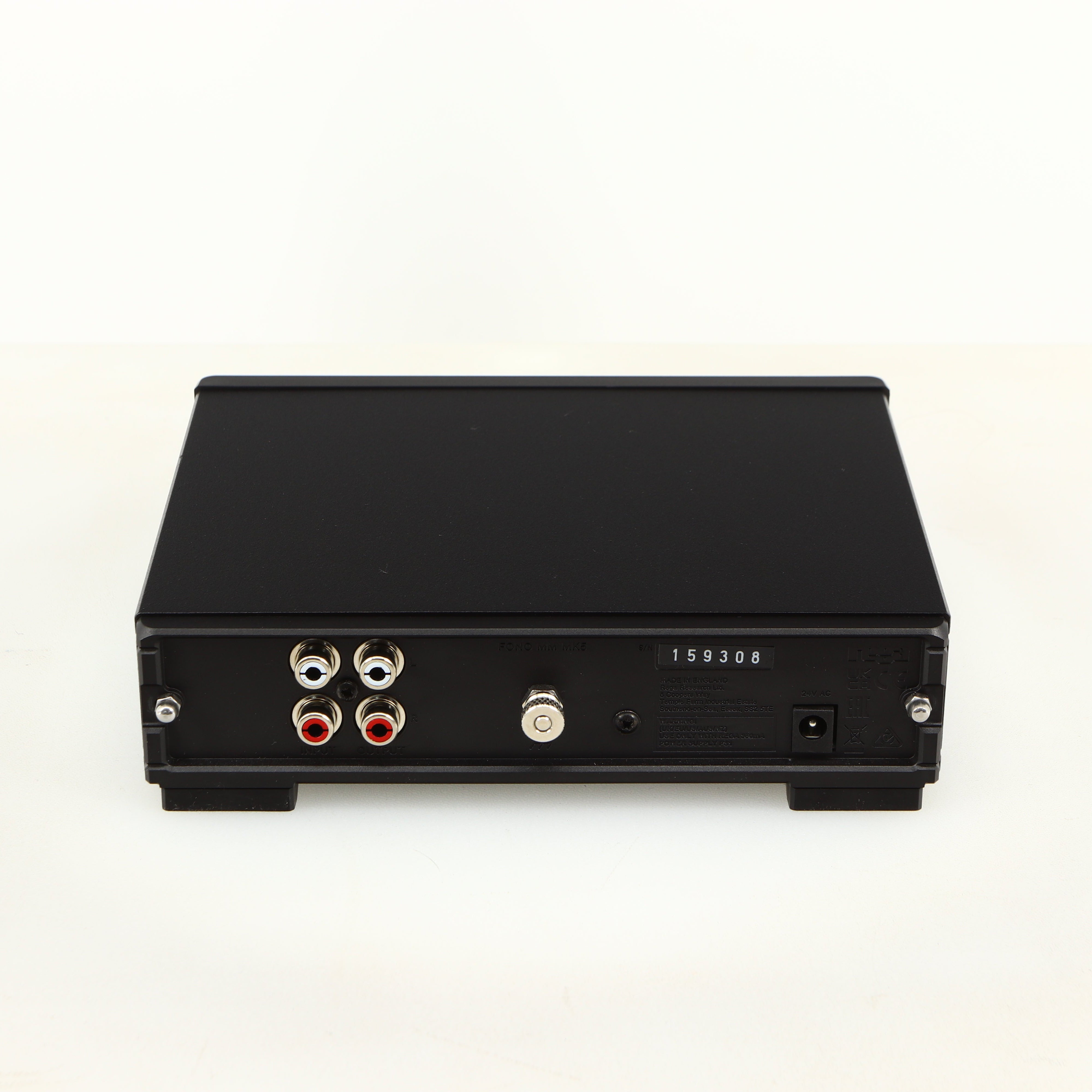 Rear view of a used Rega FONO MM MK5 Phonostage in a black finish showing Power Input, Phono Inputs and Phono Outputs 