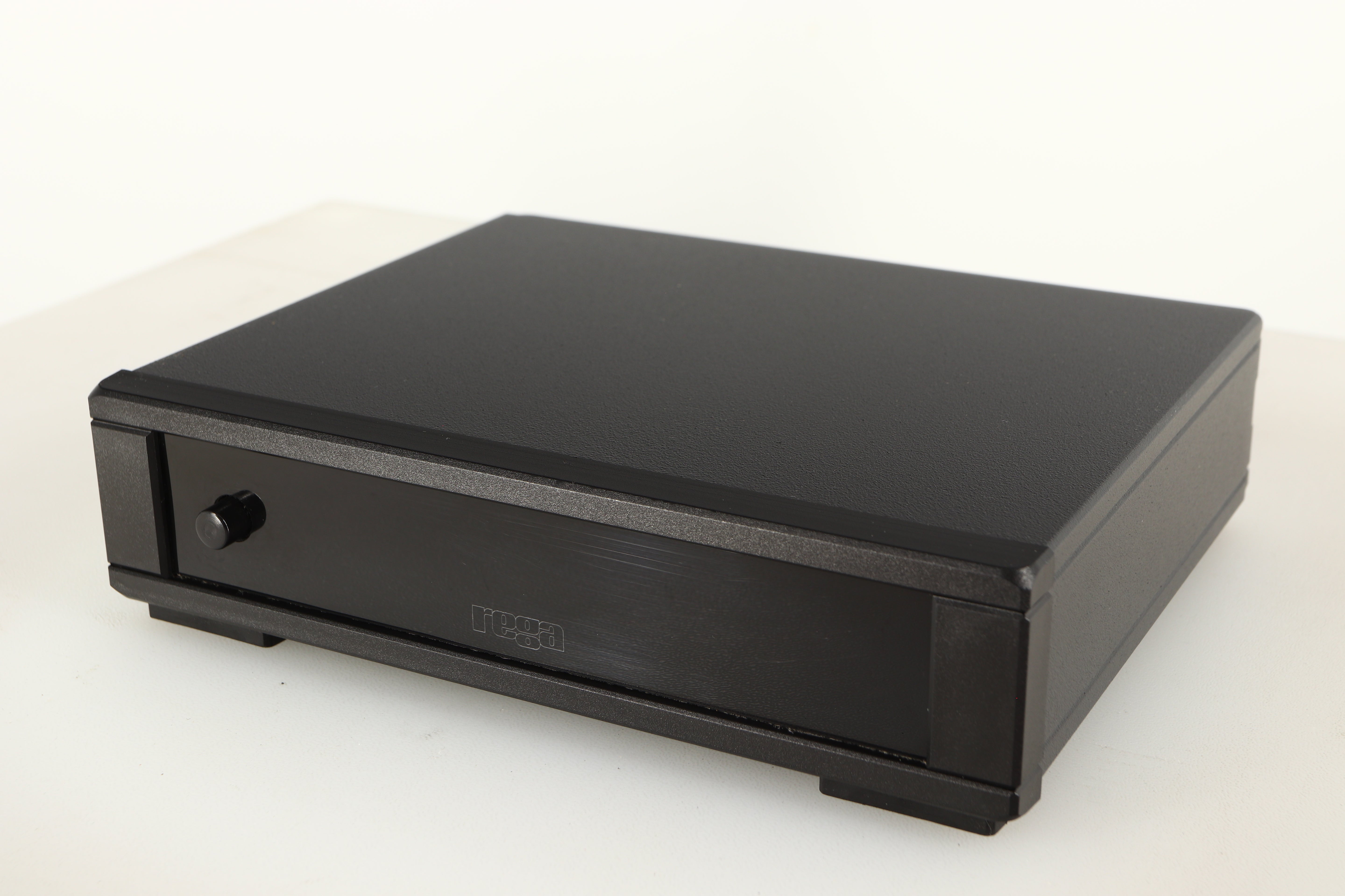 Close up of a used Rega FONO MM MK5 Phonostage in a black finish showing scratching on screen