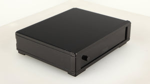Front left corner of a used Rega FONO MM MK5 Phonostage in a black finish