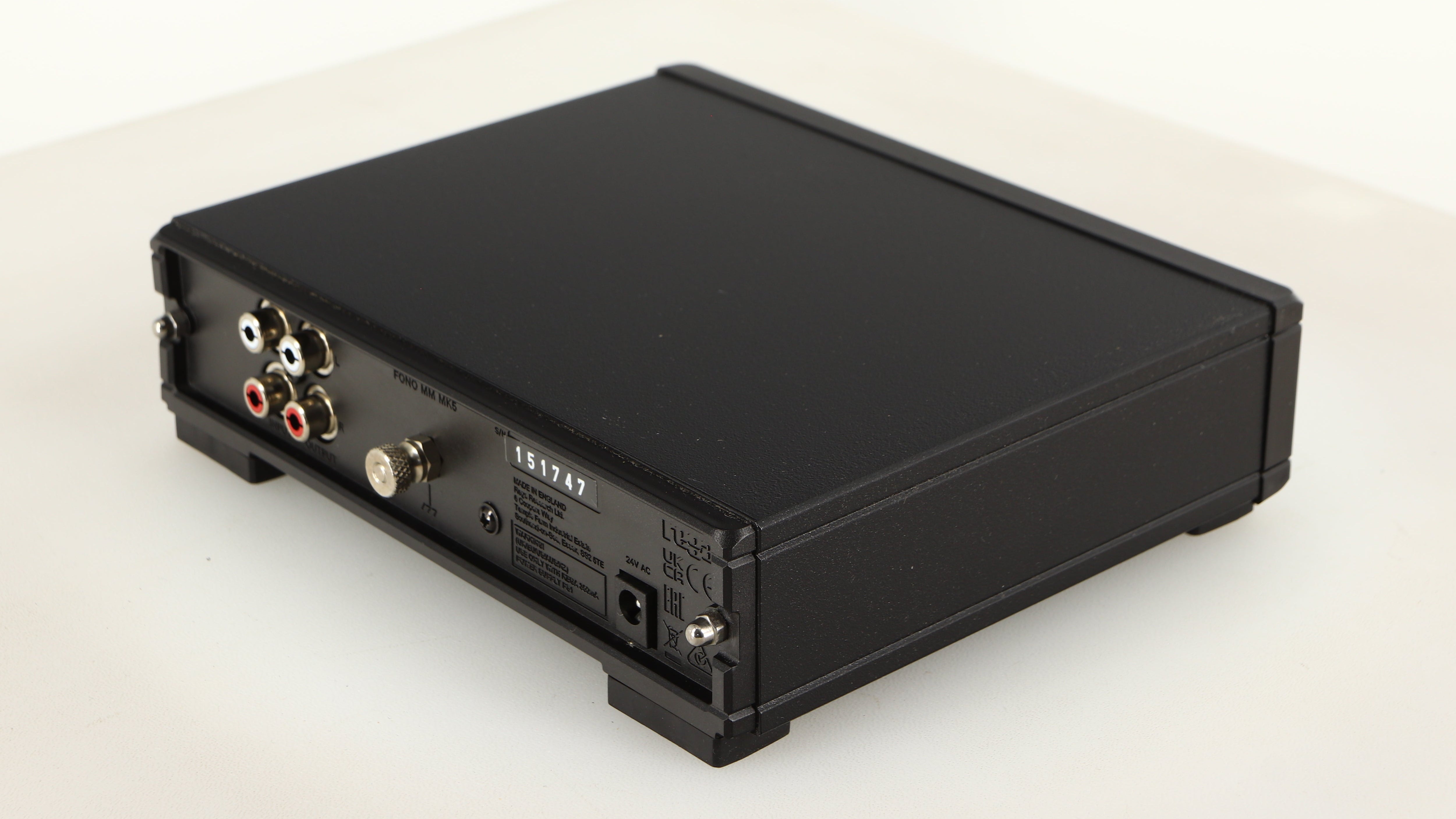 Rear left corner of a used Rega FONO MM MK5 Phonostage in a black finish
