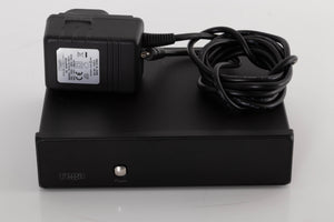 Front view of a used Rega FONO MM Phonostage with mains cable