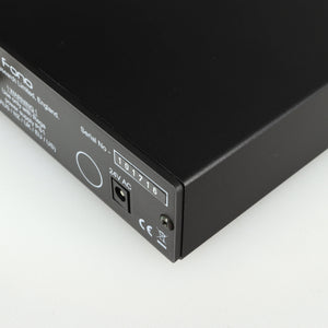 Close up of a used Rega FONO MM Phonostage in a black finish showing the serial number