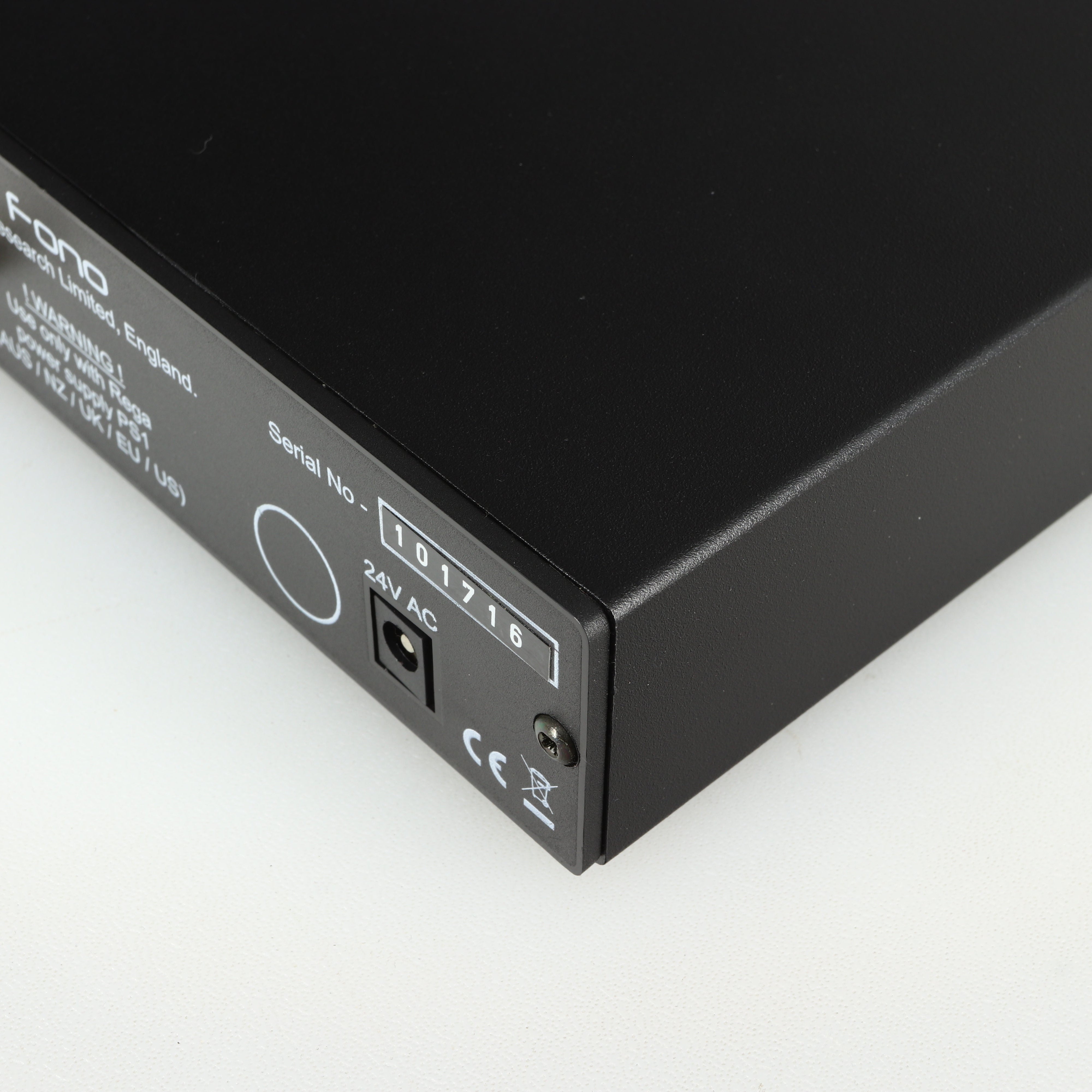 Close up of a used Rega FONO MM Phonostage in a black finish showing the serial number