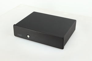 Close up of a used Rega FONO MM Phonostage with a black finish showing the screen