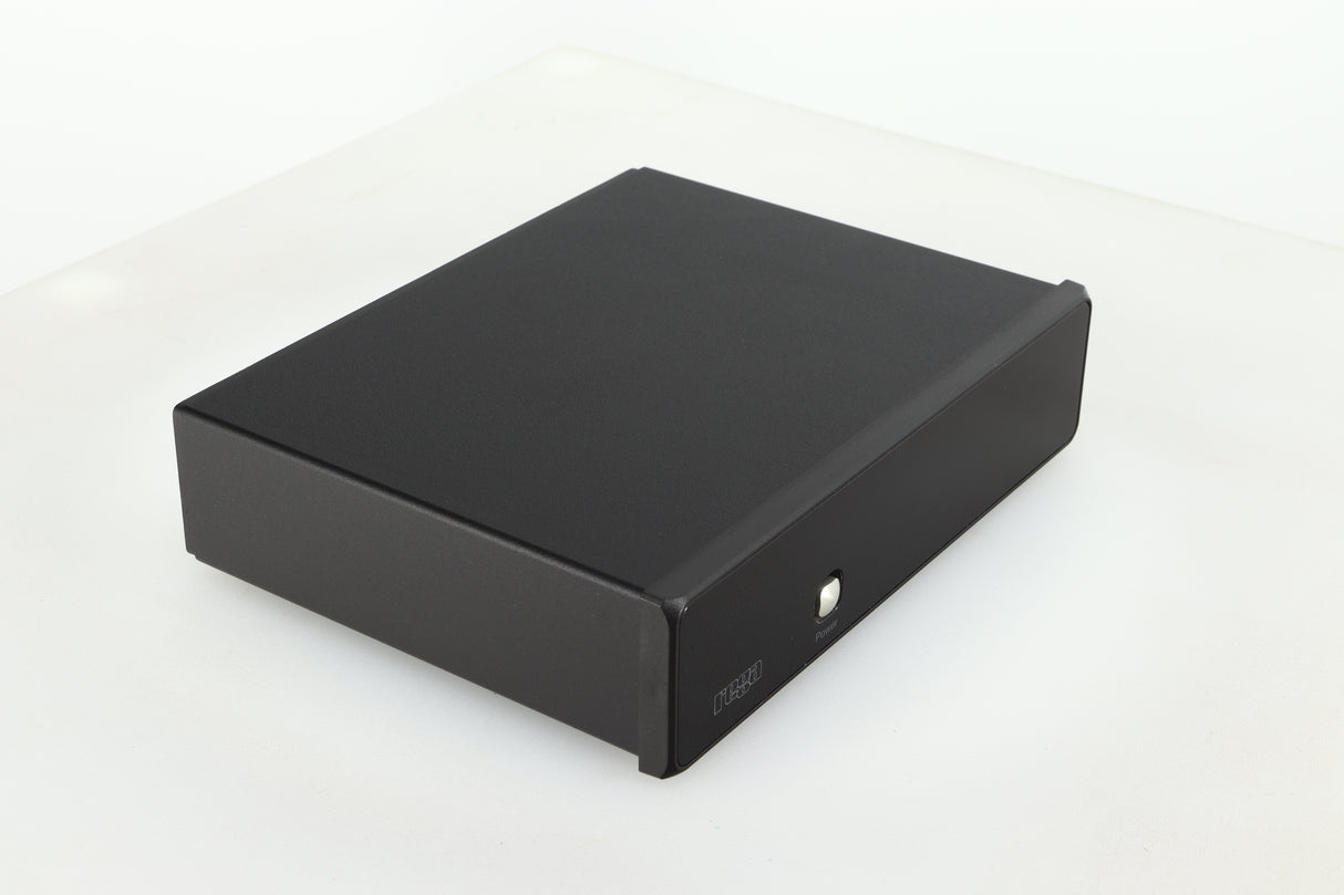 Front left corner of a used Rega FONO MM Phonostage with a black finish