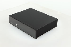 Front right corner of a used Rega FONO MM Phonostage with a black finish