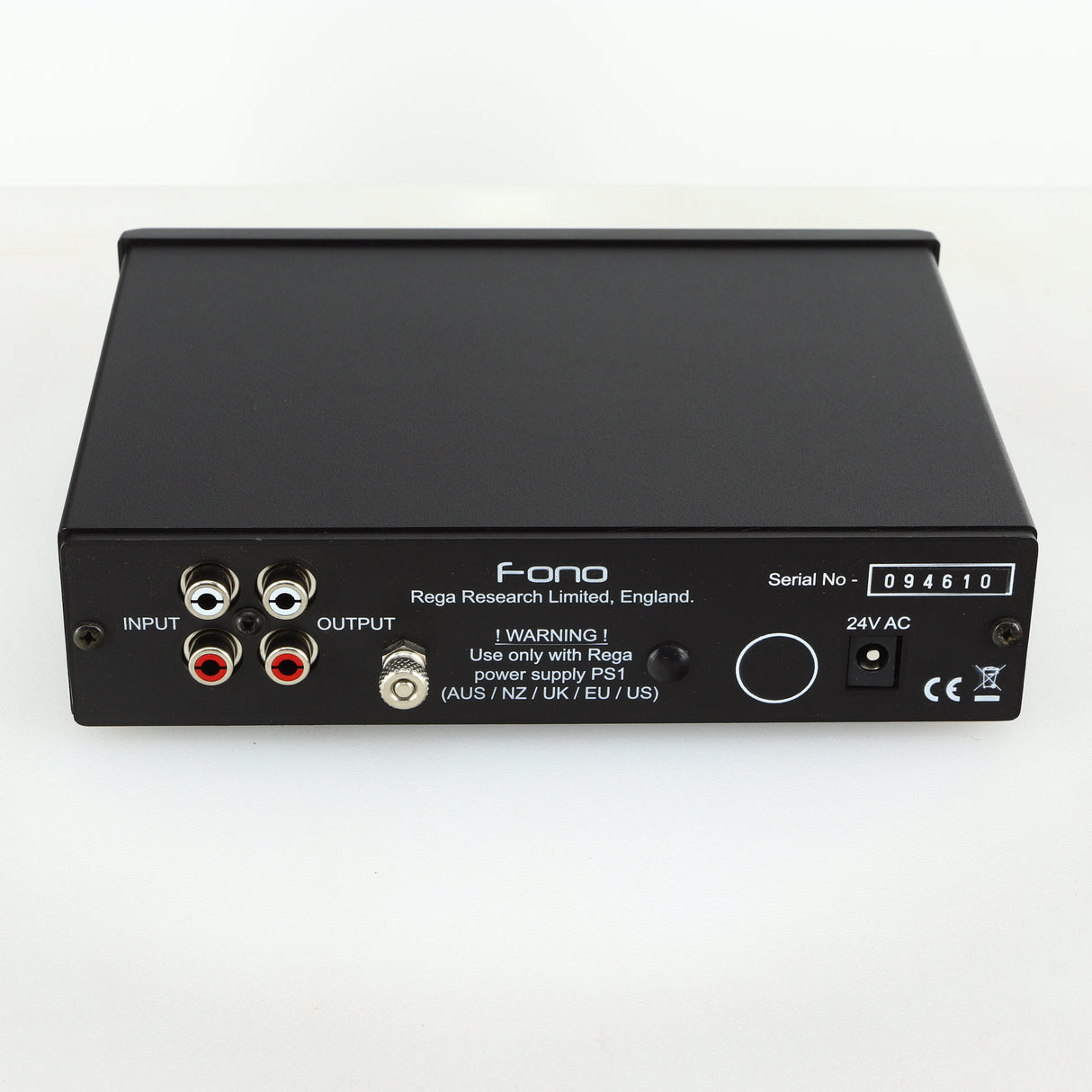 Rear view of a used Rega FONO MM Phonostage with a black finish showing Power Input and Phono Inputs and Outputs