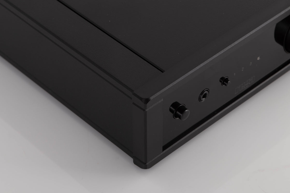 Front left corner of a used Rega IO Integrated Amplifier in a Black finish