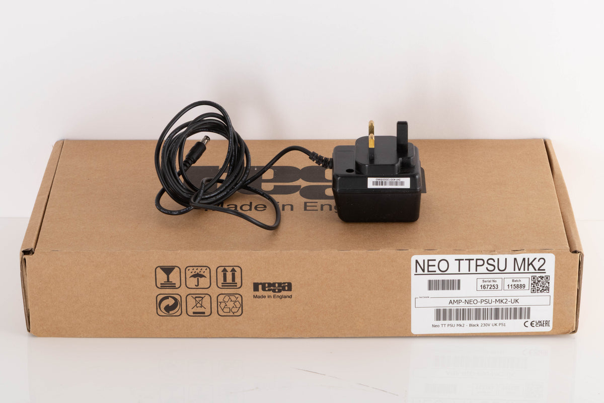 Box for a used Rega NEO Turntable Power Supply in a Black finish showing PSU